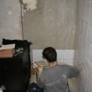 Jas tiling the front bathroom