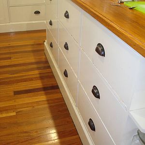 Timber strips between drawers