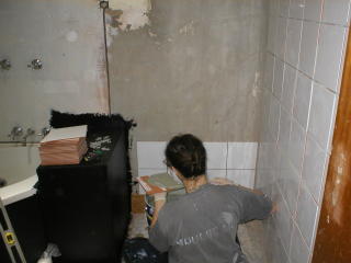 Jas tiling the front bathroom