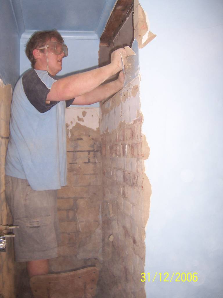 Walsh St - brick wall around bath removal